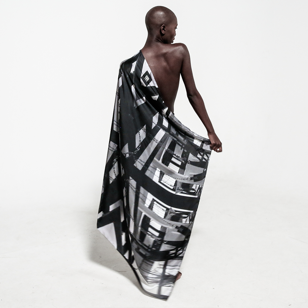 back view silk scarf wrapped around shoulder over white background