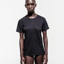 Load image into Gallery viewer, front view model in black t-shirt white print over white background