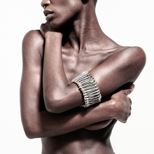 Load image into Gallery viewer, model safety pin arm band over white background
