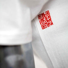 Load image into Gallery viewer, close up white t-shirt with red qr code
